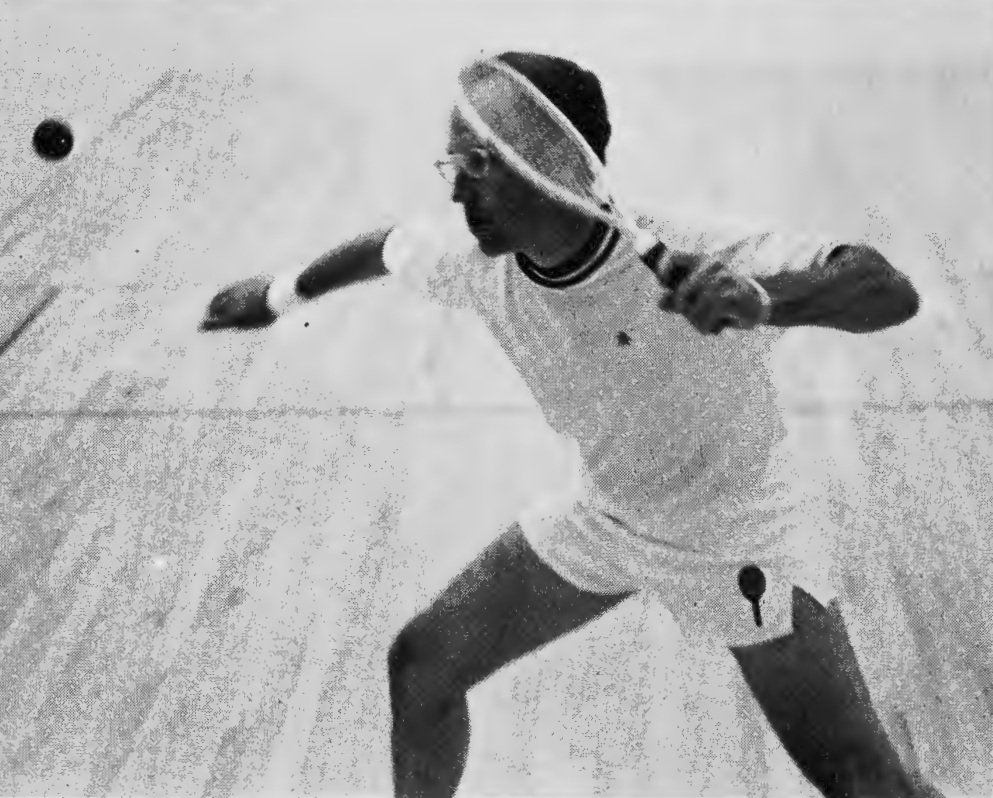 Bud Muehleisen prepares a forehand off the back wall.