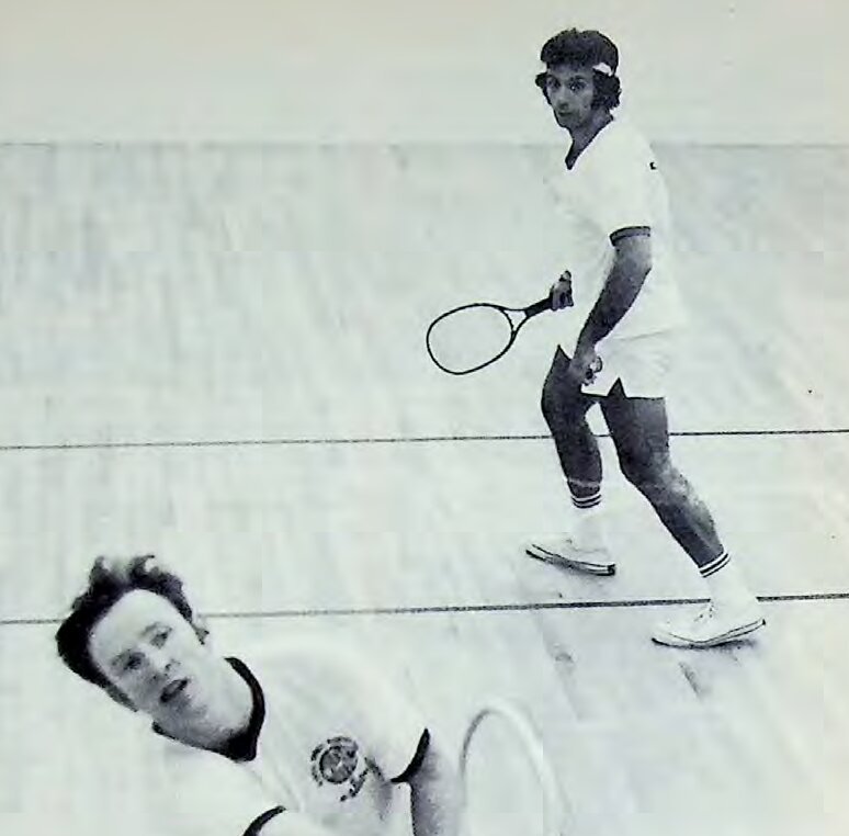 1973 racquetball match photo featuring two players on court, from Touring The Racquetball Court.